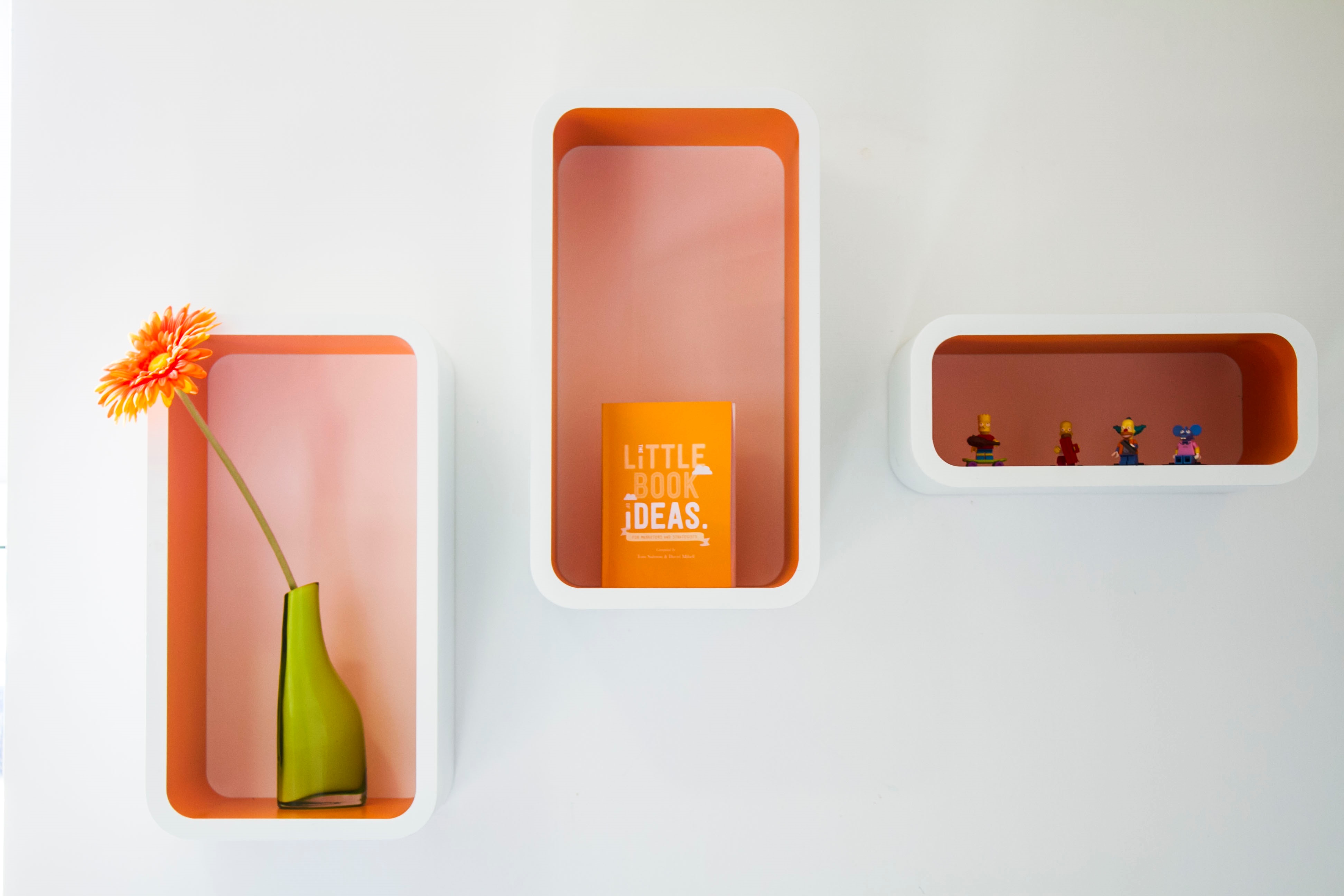 CSI Media Office Interior Orange cupboards & various ornaments in the CSI Media office
